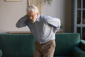 Older man with low back pain